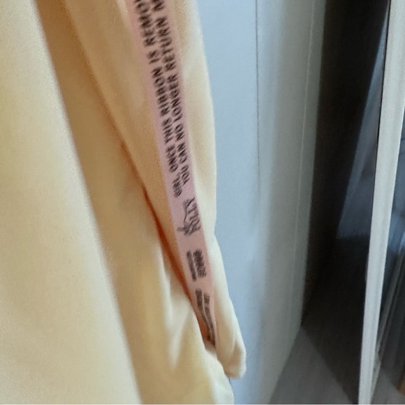 JOSIANE
Asymmetric Draped Mini Dress in Yellow - Picture 7 of 14